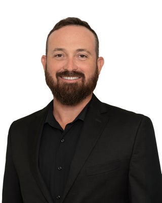 Portrait of Christoffer Calhoon, REALTOR®